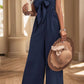 _SOLID COLOR TUBE TOP BOW JUMPSUIT