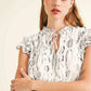 White Abstract Print Ruffle Flutter Sleeves and Tie Neck Detail Summer Mini Dress